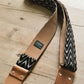 striped black guitar strap