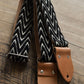 black guitar strap, woven