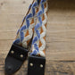 blue and yellow guitar strap