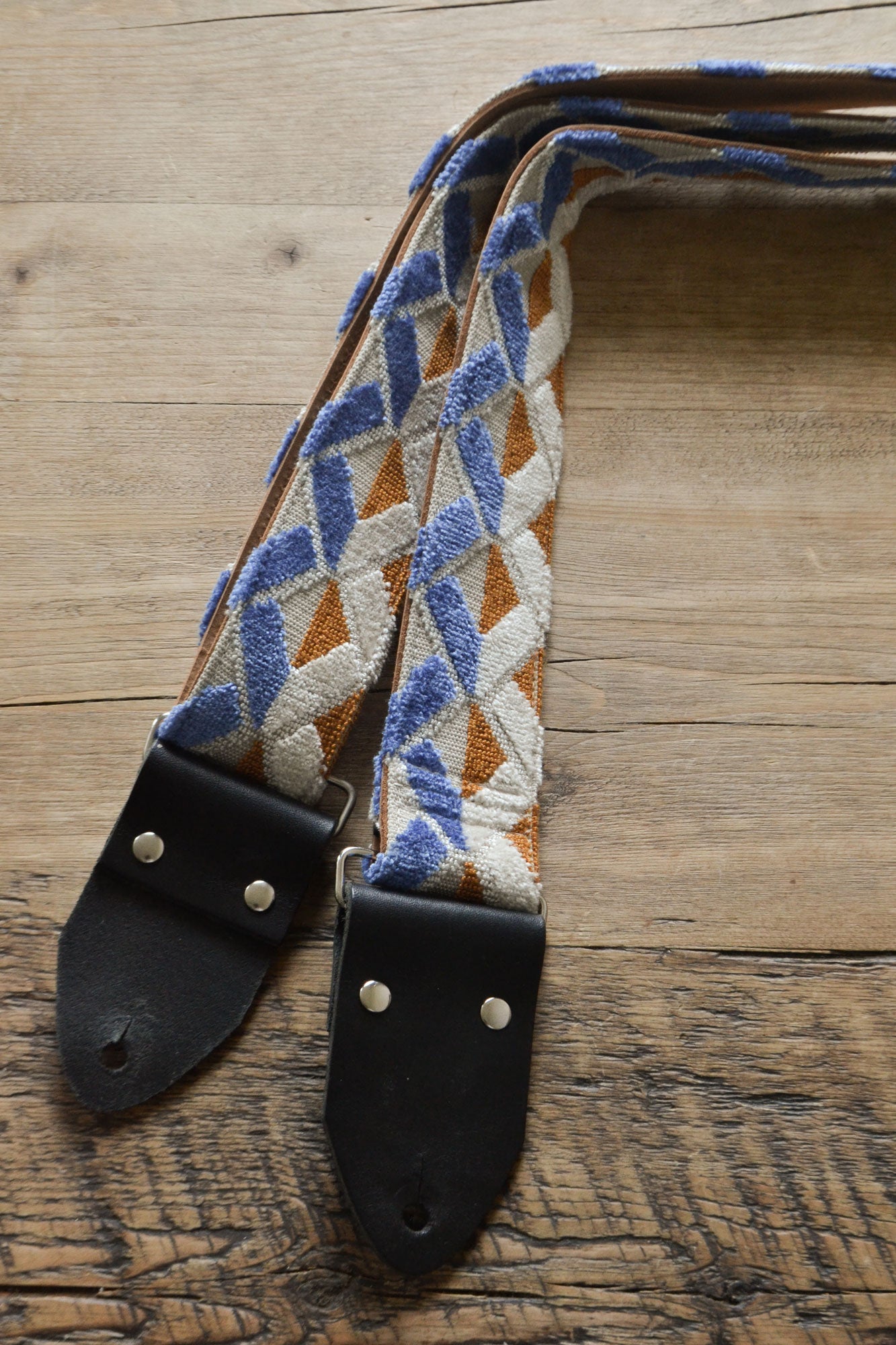 blue and yellow guitar strap