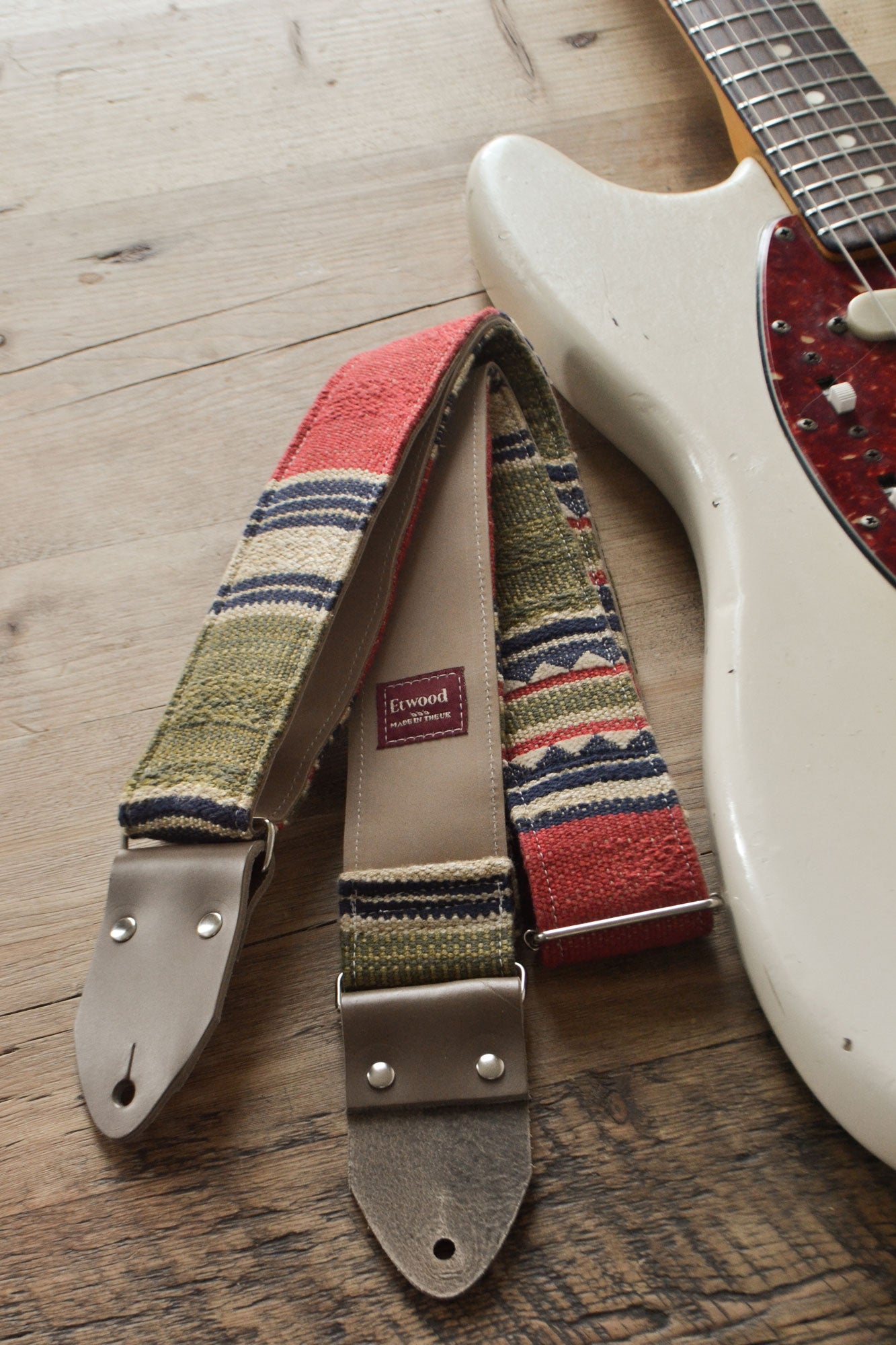 Red and green guitar strap